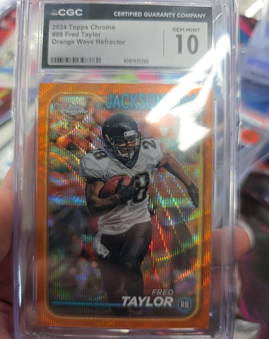 2024 Topps Chrome #89 Fred Taylor Orange Wave Refractor — front