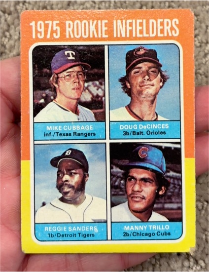 1975 Topps #617 Rookie Infielders Mike Cubbage / Doug DeCinces / Reggie Sanders / Manny Trillo — front