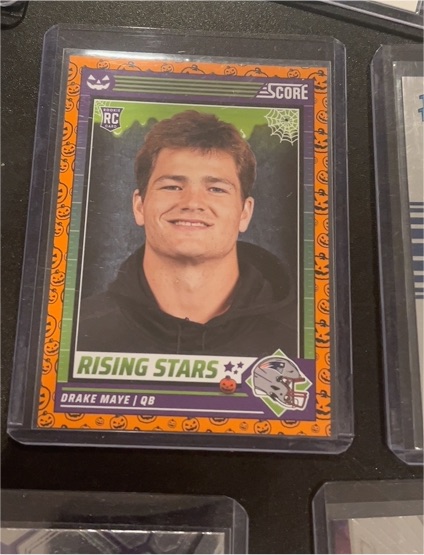 2024 Panini Score-A-Treat #17 Drake Maye Orange Pumpkins Rookie Card — front