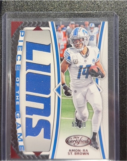 2024 Panini Certified Piece of the Game #POG-ASB Amon-Ra St. Brown — front
