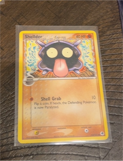 2006 Pokémon EX Dragon Frontiers #63 Shellder (Delta Species) — front