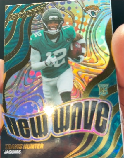 2025 Panini Revolution #7 Travis Hunter — front