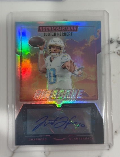 2021 Panini Rookies & Stars Airborne Justin Herbert — front