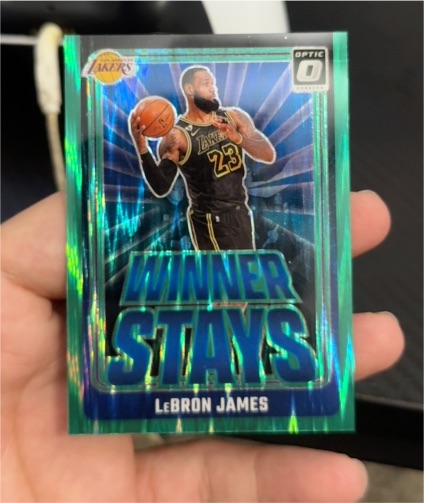 2024-25 Panini Donruss Optic #1 LeBron James Winner Stays Purple Holo Prizm — front