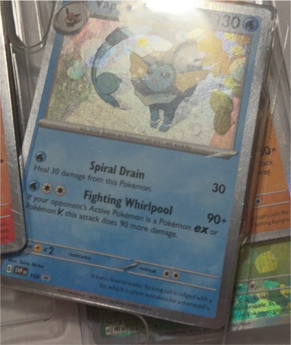 2025 Pokémon Vaporeon #168 Cosmos Holo Black Star Promo — front