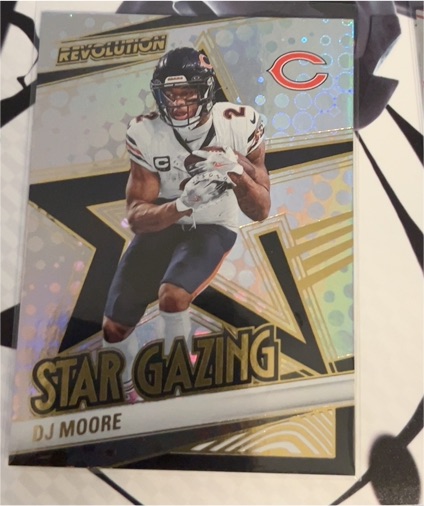 2025 Panini Revolution #4 DJ Moore — front