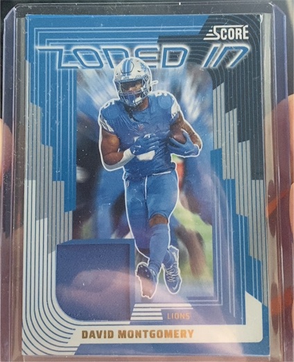 2025 Panini Score #ZON-DMY David Montgomery Zoned In Jersey — front