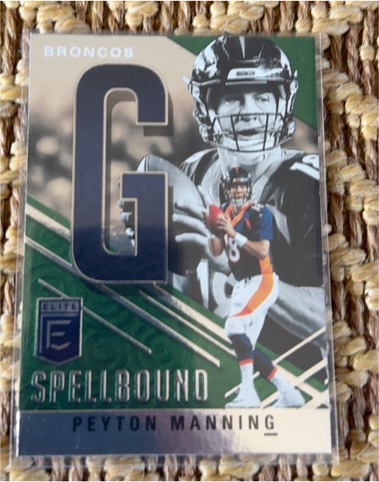 2021 Donruss Elite #S-G Peyton Manning Spellbound G Green Parallel — front