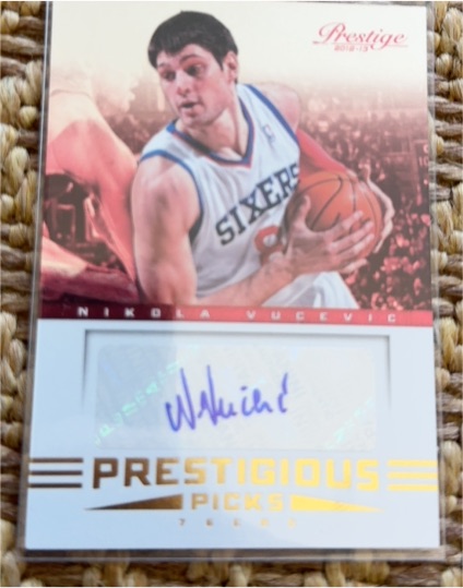 2012-13 Panini Prestige Prestigious Picks #15 Nikola Vucevic — front
