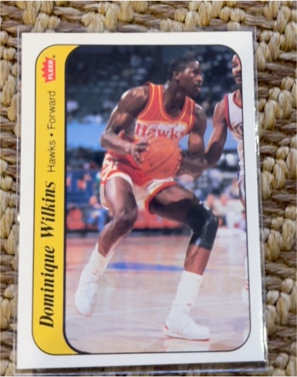 1986 Fleer Sticker #11 Dominique Wilkins — front