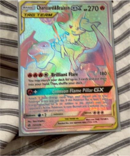 2019 Pokémon Sun & Moon Cosmic Eclipse #251 Charizard & Braixen GX — front