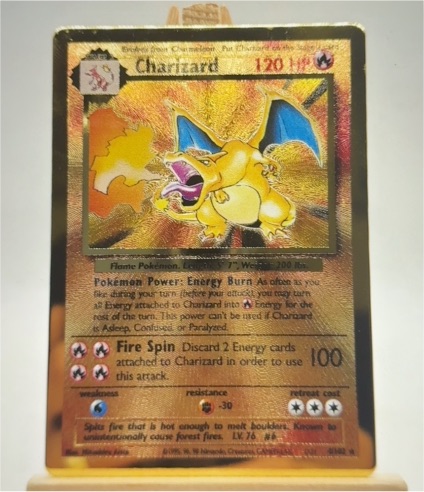 2021 Pokémon Celebrations #4 Charizard Gold Metal Card — front