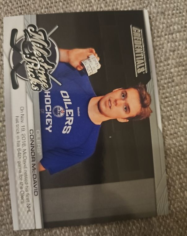 2024-25 Upper Deck Credentials Milestone Pucks #MP-CM Connor McDavid — front