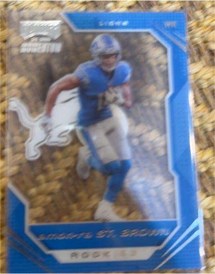 2021 Panini Chronicles Playoff Momentum Rookies #PMR-28 Amon-Ra St. Brown — front