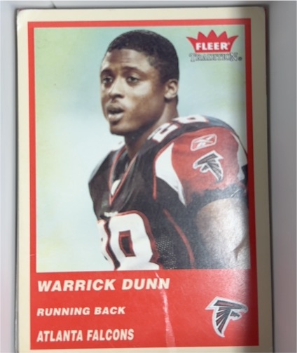 2004 Fleer Tradition #95 Warrick Dunn — front