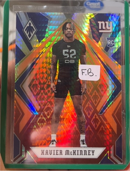2020 Panini Phoenix #156 Xavier McKinney Fire Burst Rookie Card — front