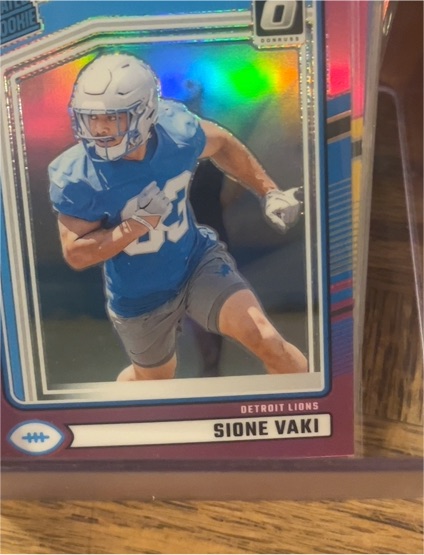 2024 Donruss Optic Pink Prizm #332 Sione Vaki Rookie RC Lions Football Card — front