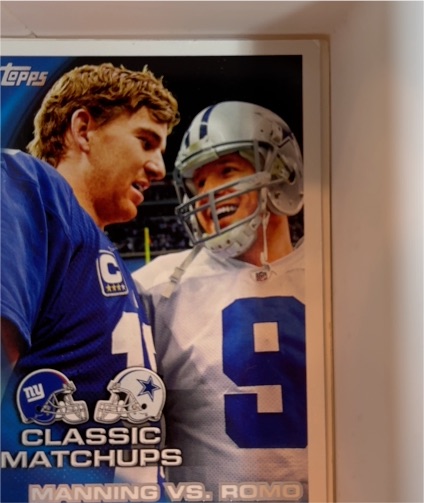 2010 Topps #226 Manning vs. Romo — front