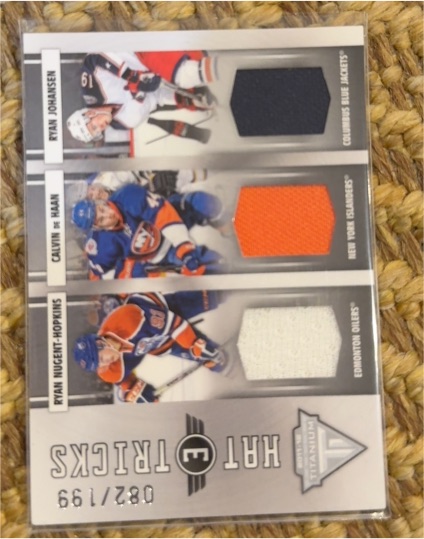2011-12 Panini Titanium Hat Tricks #30 Ryan Nugent-Hopkins/Calvin de Haan/Ryan Johansen — front