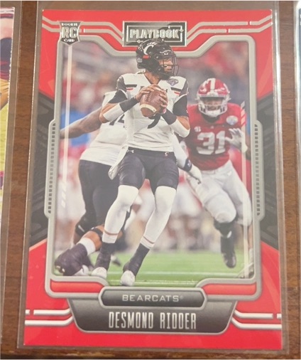 2022 Panini Chronicles Draft Picks Playbook #7 Desmond Ridder — front