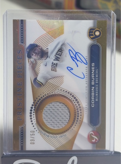 2024 Topps Pristine Pristine Pieces Orange Refractor Autograph Relic #PPAR-CB Corbin Burnes — front