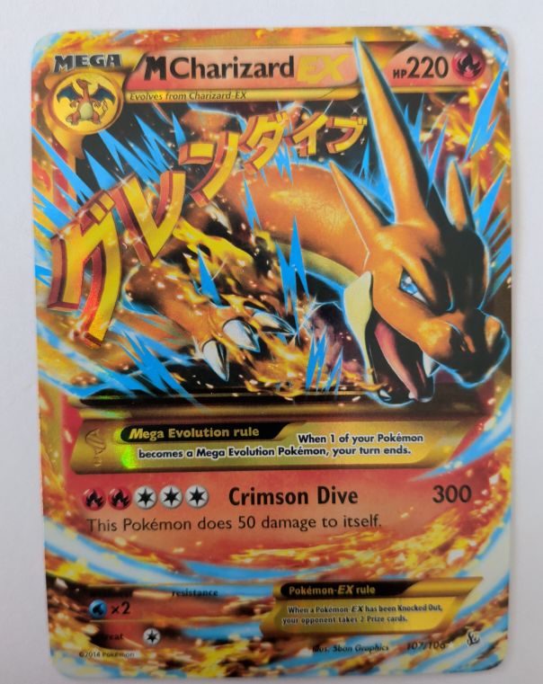 2014 Pokemon Mega Charizard EX 107/106 — front