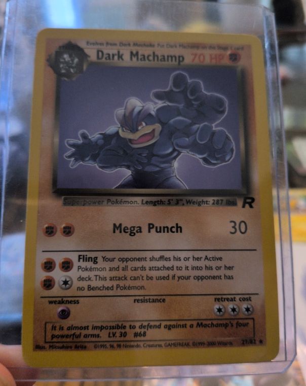 1999 Pokémon Team Rocket #27 Dark Machamp — front