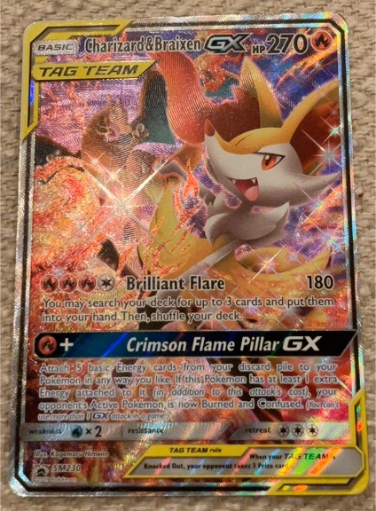 2019 Pokémon SM Black Star Promo #SM230 Charizard & Braixen GX — front