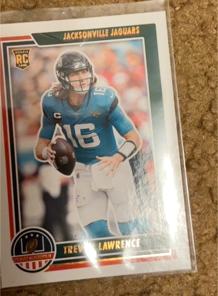 2021 Panini Chronicles Stars & Stripes #STS-TLR Trevor Lawrence — front
