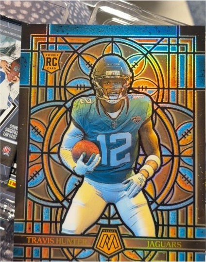 2025 Panini Mosaic #12 Travis Hunter — front