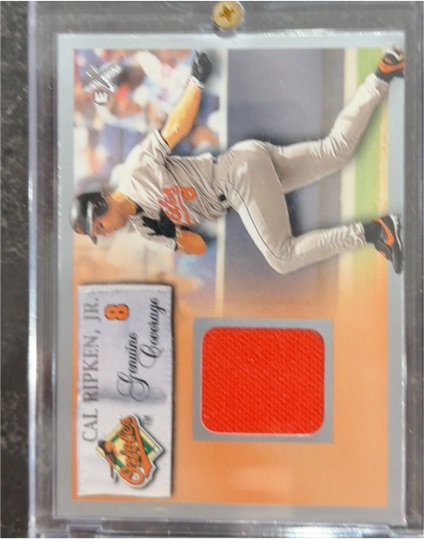 2000 Fleer E-X Cal Ripken Jr. Genuine Coverage Game-Worn Jersey — front