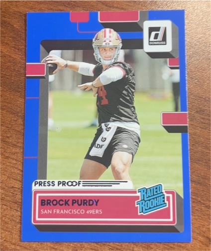 2022 Donruss #374 Brock Purdy Press Proof Blue Rated Rookie — front