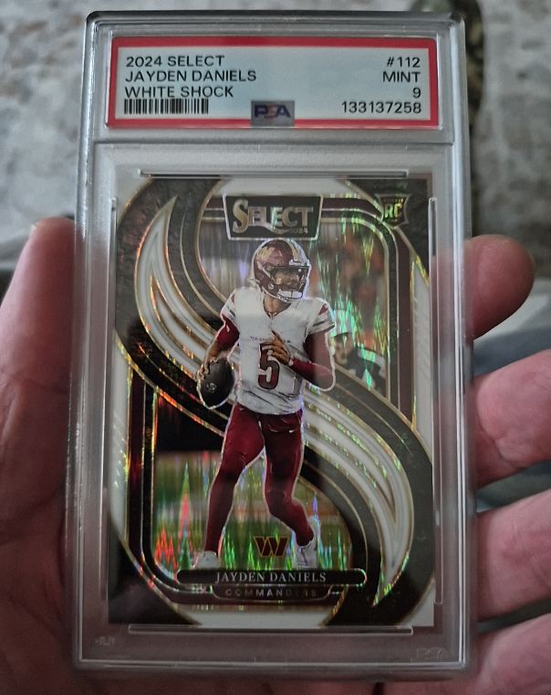2024 Panini Select Premier Level #112 Jayden Daniels White Shock — front