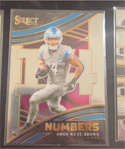 2023 Panini Select #NMB-AST Amon-Ra St. Brown — front
