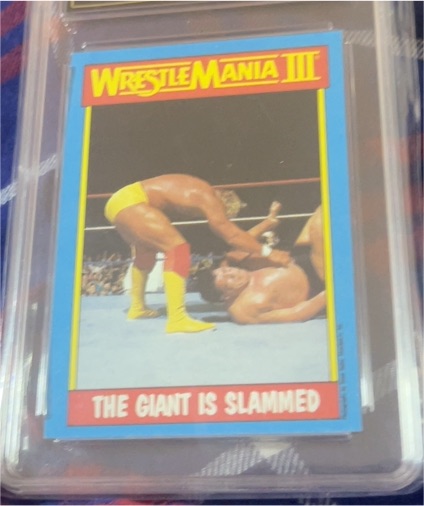 1987 Topps WWF WrestleMania III #54 The Giant is Slammed Hulk Hogan/Andre The Giant — front