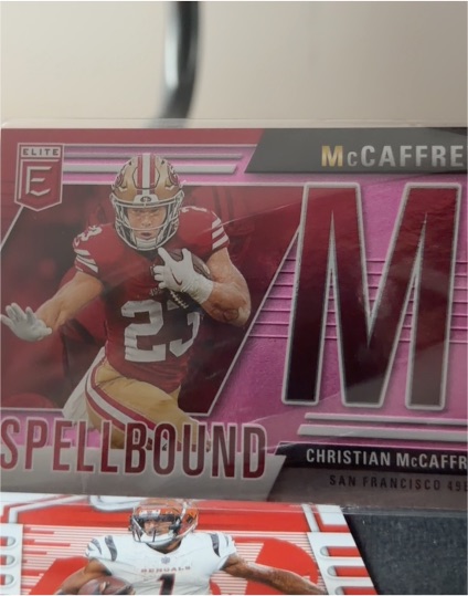 2024 Panini Donruss Elite #12 Christian McCaffrey Spellbound Pink — front