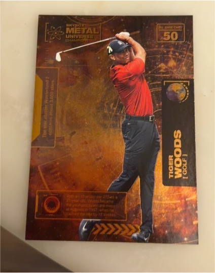 2021 Skybox Metal Universe Champions #50 Tiger Woods — front
