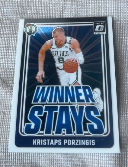 2024-25 Panini Donruss Optic #9 Kristaps Porzingis Winner Stays — front