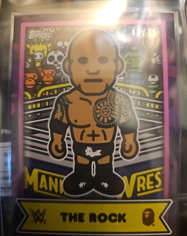 2025 Topps WWE X BAPE #BMA-3 The Rock Baby Milo Purple Camo — front