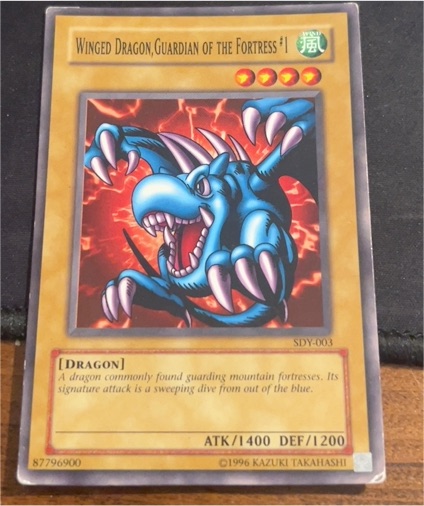 1996 Yu-Gi-Oh! #SDY-003 Winged Dragon, Guardian of the Fortress #1 — front
