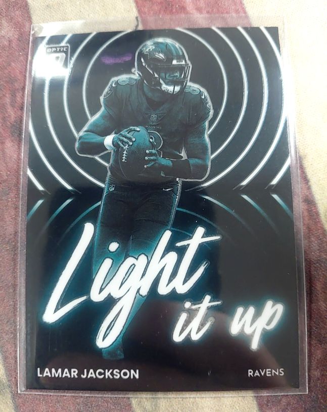 2022 Donruss Optic #LU-1 Lamar Jackson Light it Up — front