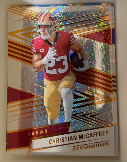 2025 Panini Revolution #2 Christian McCaffrey — front