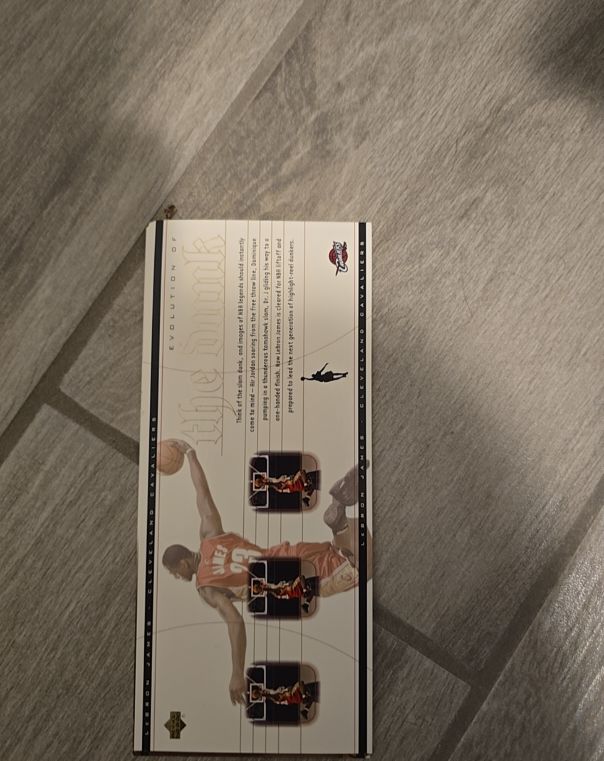 2003 Upper Deck #LJ2 LeBron James Evolution of the Dunk Rookie Card — front