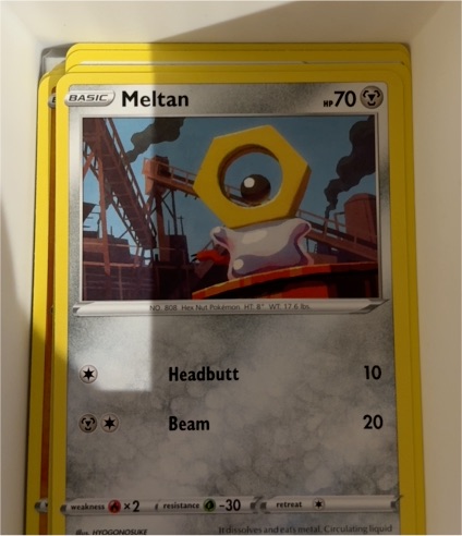 2020 Pokémon Darkness Ablaze #129 Meltan — front