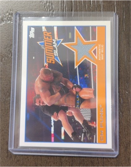 2014 Topps WWE SummerSlam #CM Punk Mat Relic — front
