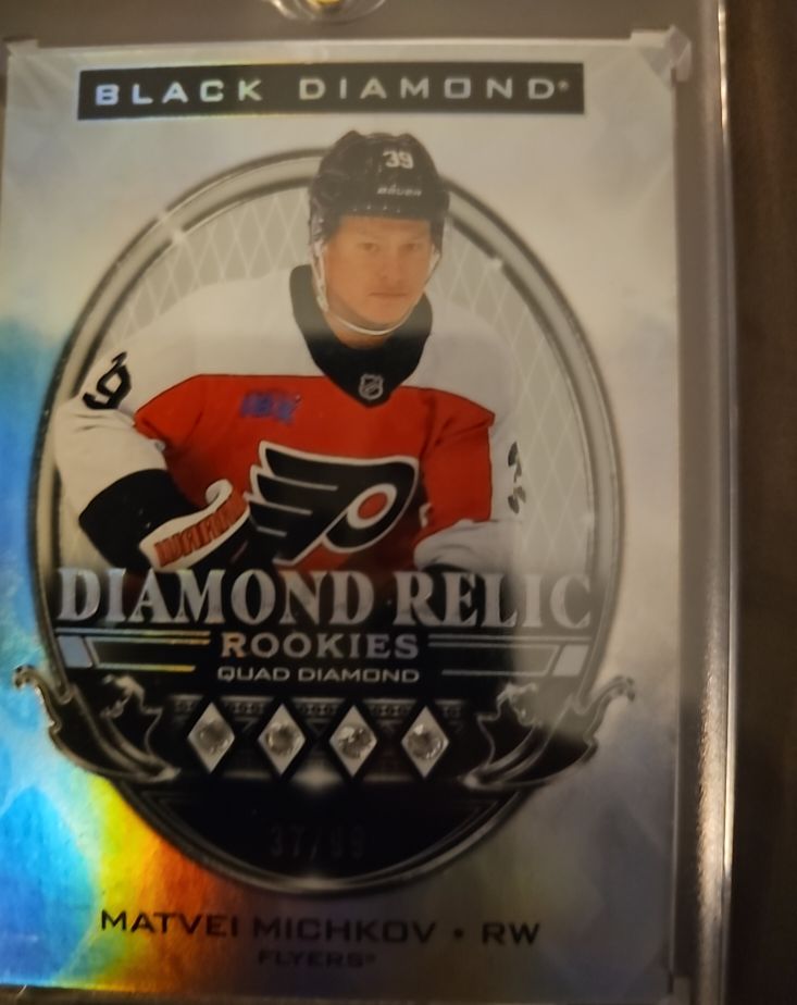 2024-25 Upper Deck Black Diamond Relic Rookies Quad Diamond Matvei Michkov — front