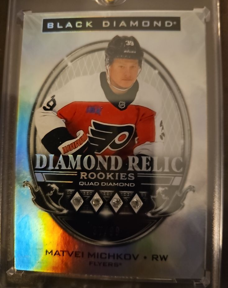 2024-25 Upper Deck Black Diamond Diamond Relic Rookies Quad Diamond Matvei Michkov — front