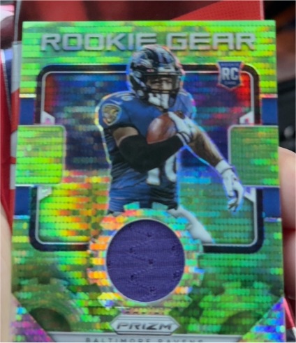 2021 Panini Prizm Rookie Gear Neon Green Pulsar #RG-16 Baltimore Ravens — front