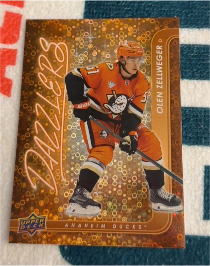 2024-25 Upper Deck #DZ-70 Olen Zellweger Orange Dazzlers Anaheim Ducks — front