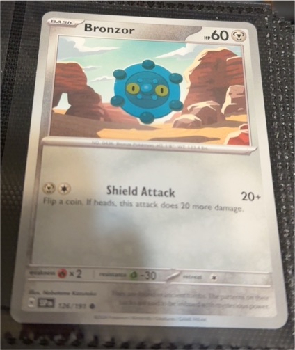 2024 Pokémon Scarlet & Violet Surging Sparks #126 Bronzor — front